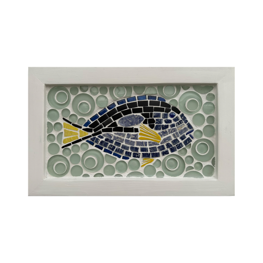 Framed mosaic artwork of a fish with a circular pattern on a white background