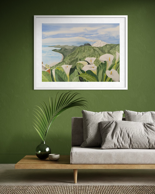 Framed watercolor landscape artwork of a coastal scene with flowers