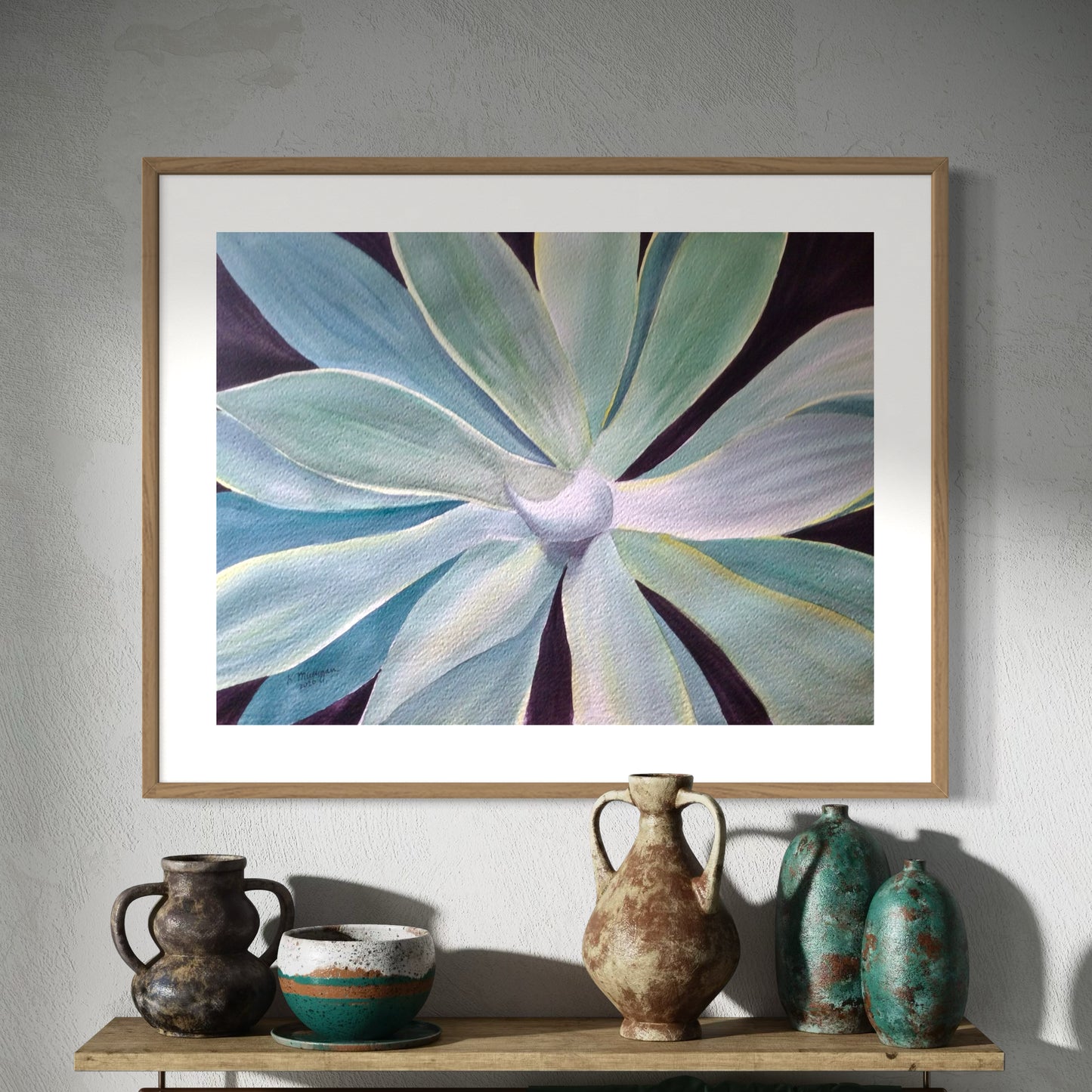 Framed watercolor painting of a large agave succulent plant.