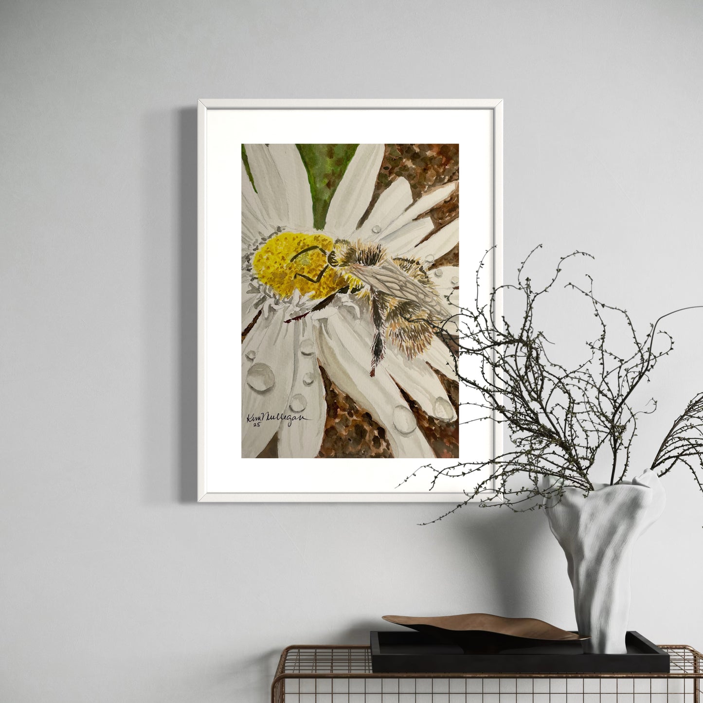 Framed watercolor painting of a daisy with water droplets and honey bee.