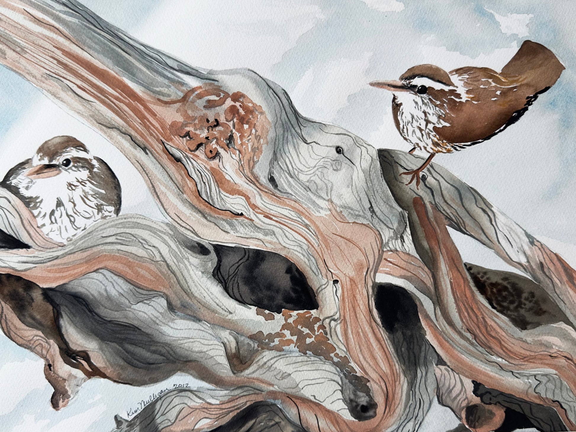 watercolor painting of carolina wrens perched onfallen log in the snow.