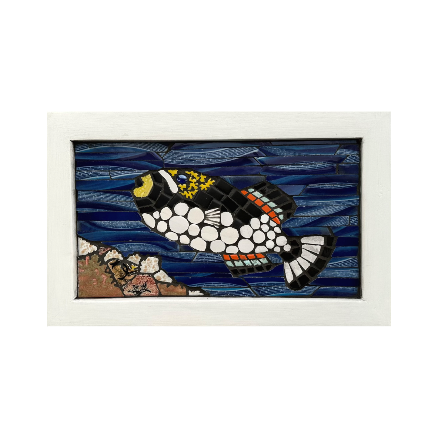 Framed mosaic artwork of a tropical clown triggerfish with a white border