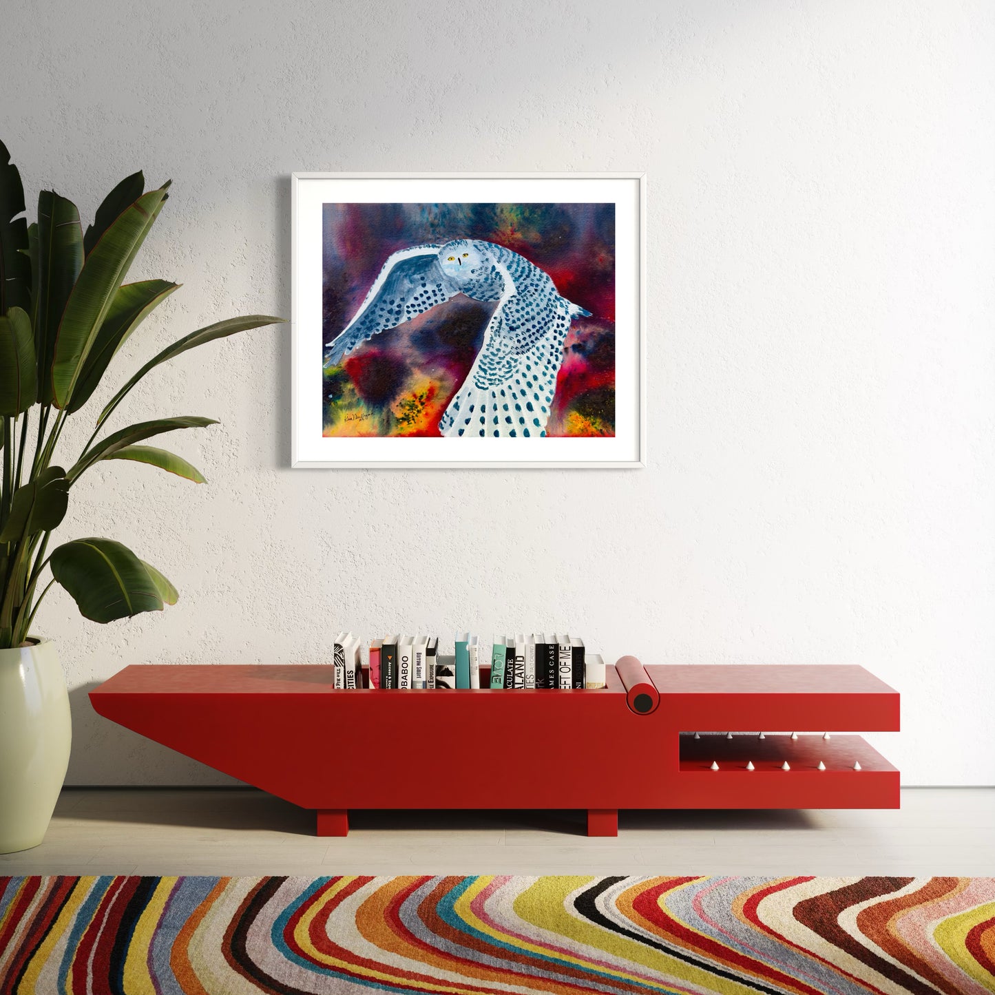 Framed watercolor painting of snowy owl in flight on colorful background