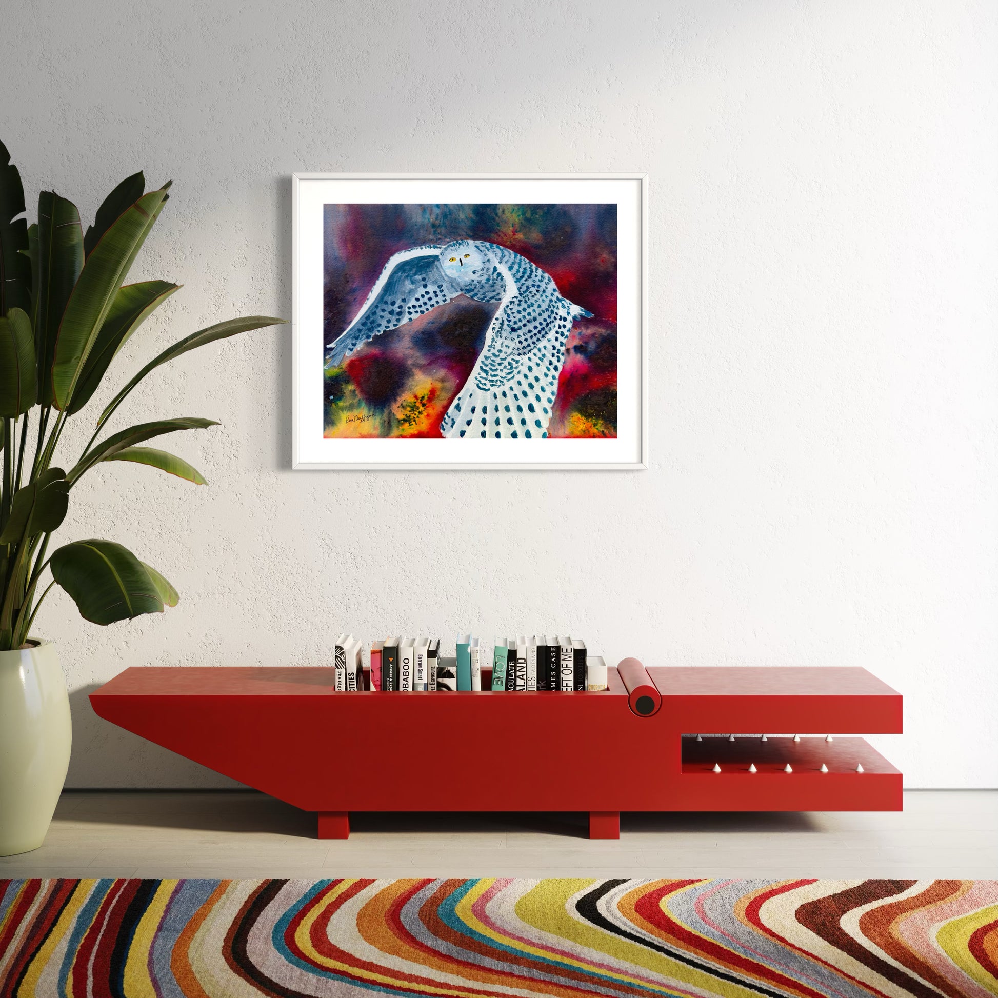 Framed watercolor painting of snowy owl in flight on colorful background
