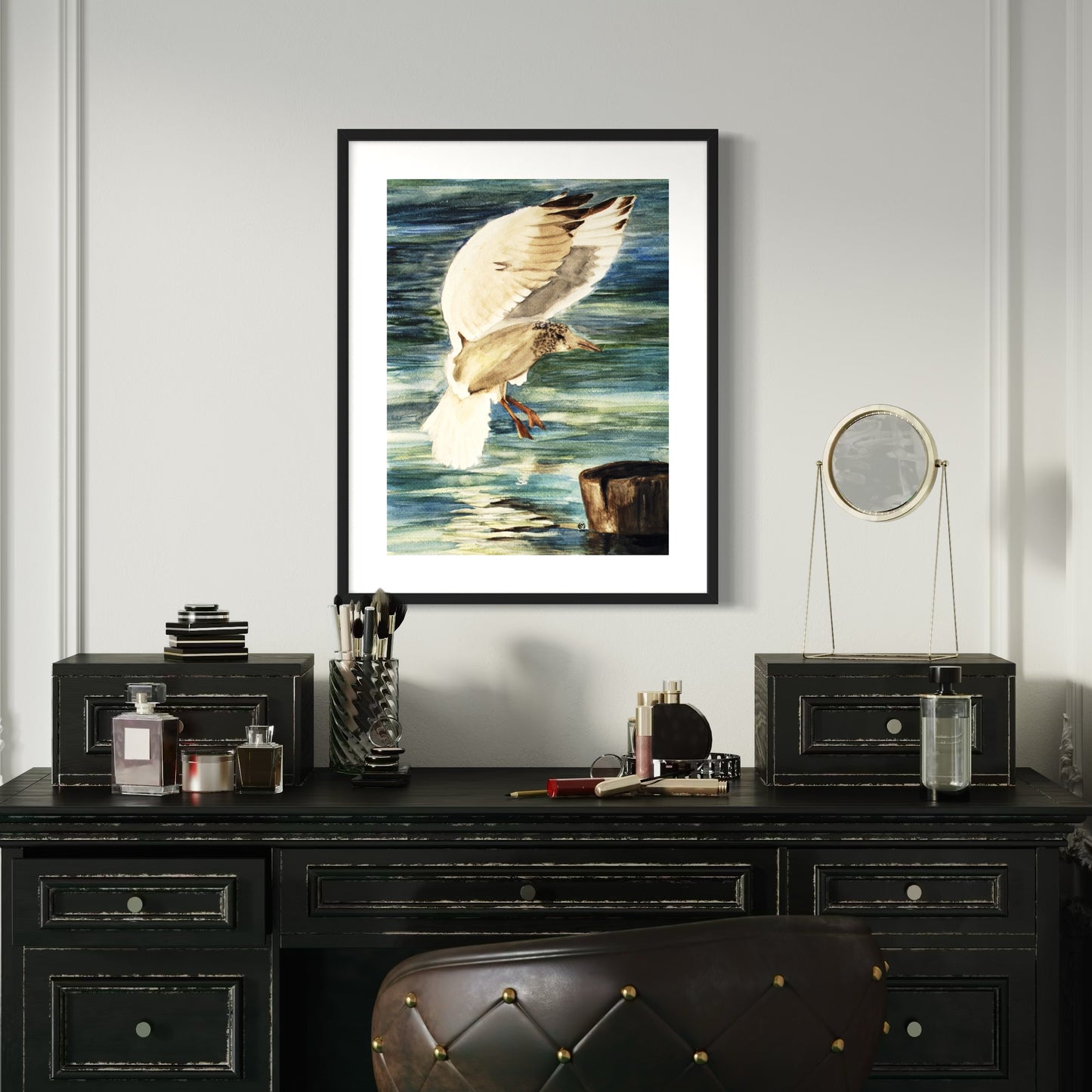 Framed watercolor artwork of a seagull bird landing on a pier over water.
