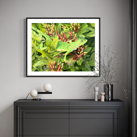 Watercolor painting of an iguana on a blooming ixora bush.
