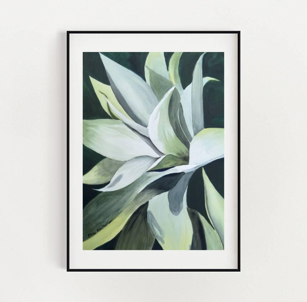 Framed watercolor artwork of an agave plant with green and white leaves on a light gray background