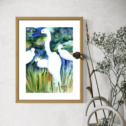 Framed artwork of egret birds in a natural setting 