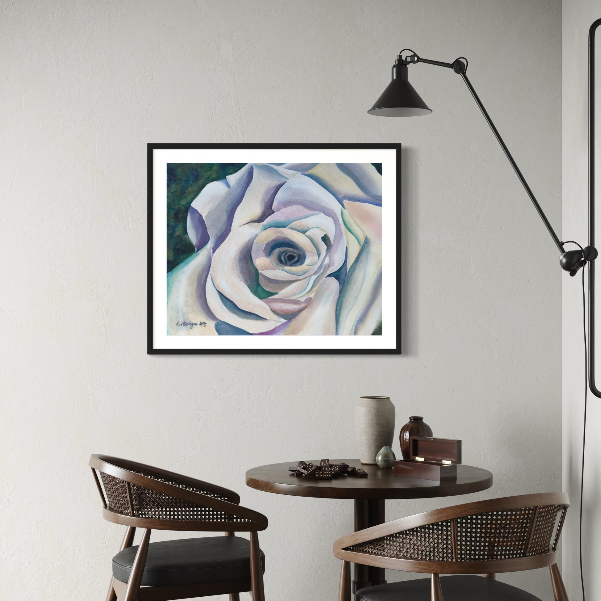Framed watercolor artwork of an abstracted, pastel colors rose.