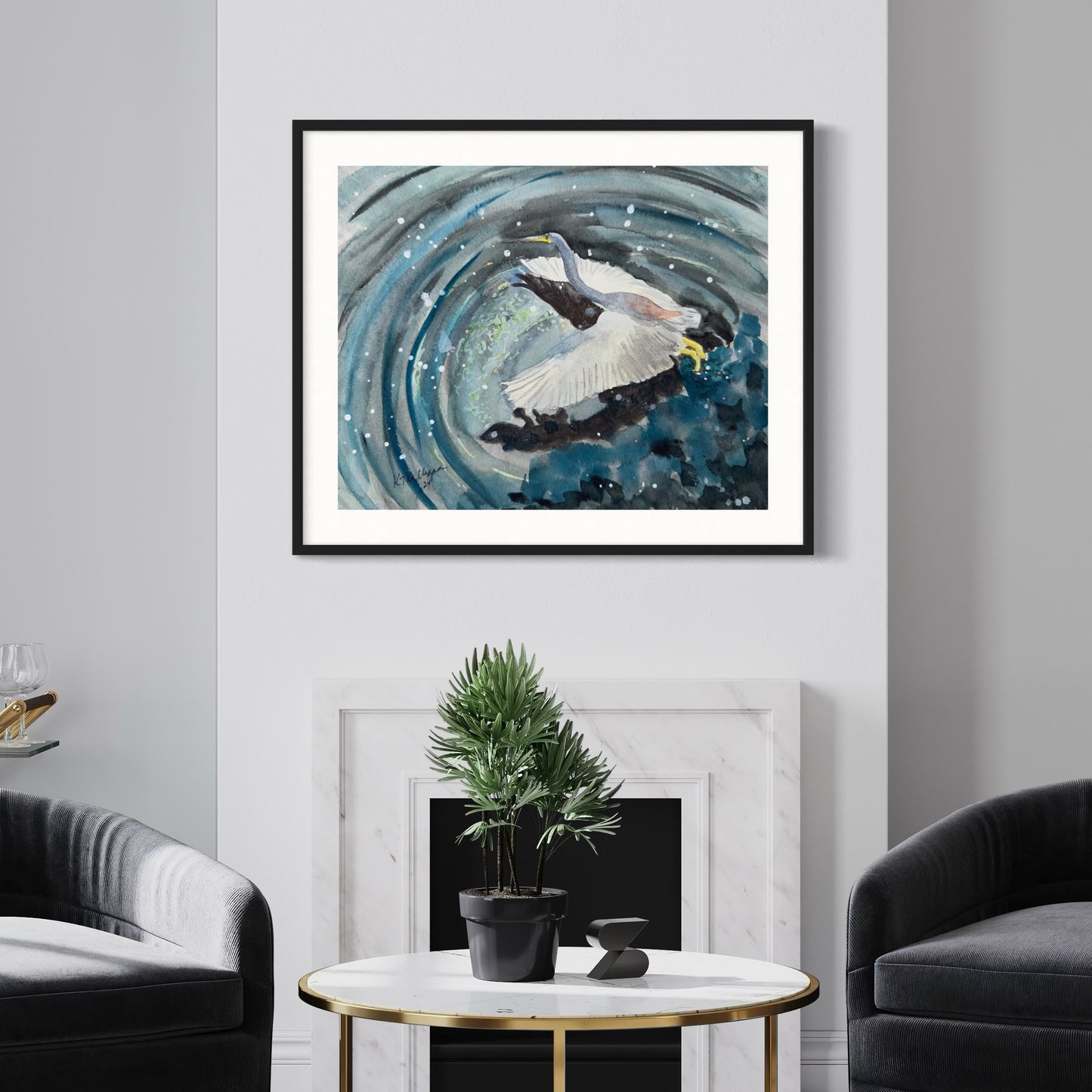 Framed watercolor artwork of a great blue heron in flight bird over water.