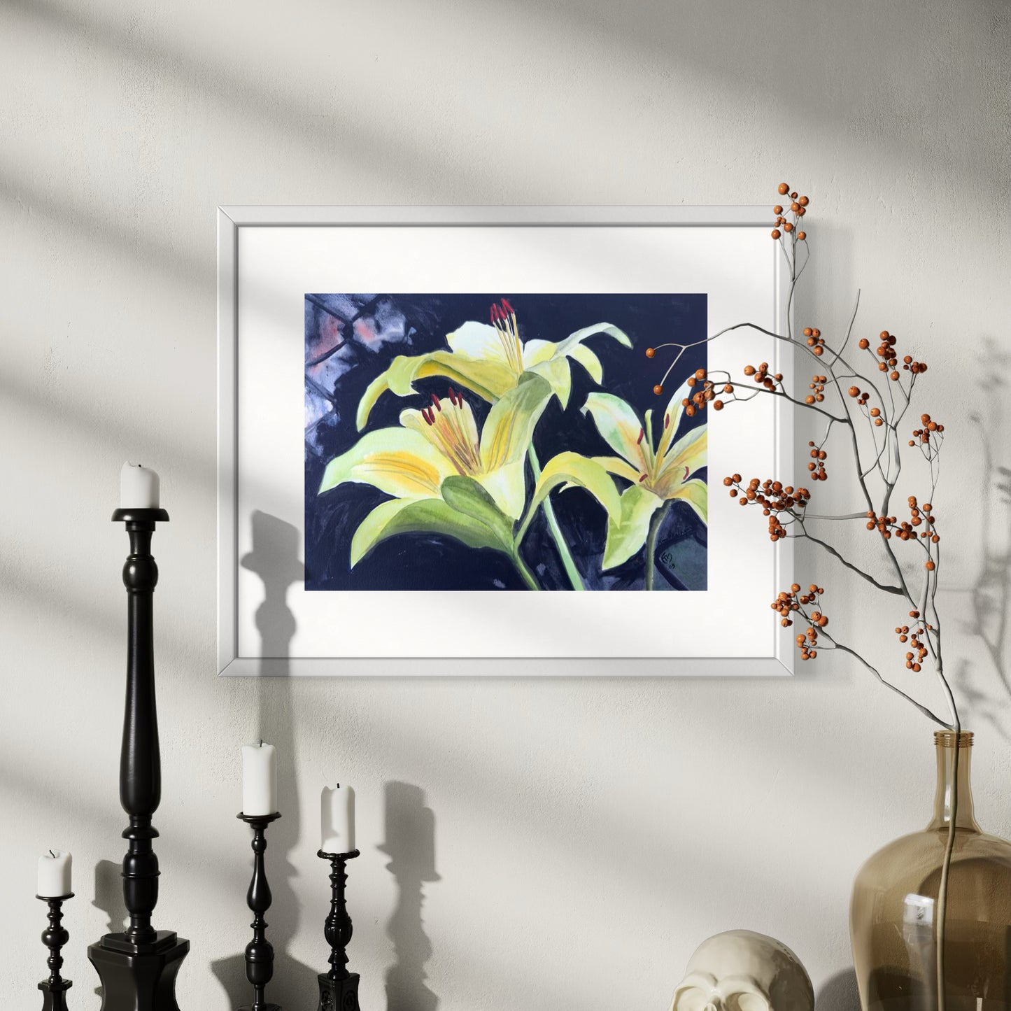 Framed watercolor artwork of yellow daylilies.
